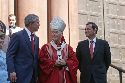 Cardinal Theodore E. McCarrick with Supreme Court Chief Justice John Roberts and President George W. Bush after a mass held for the opening session of the U.S. Supreme Court in Washington, D.C. in 2005