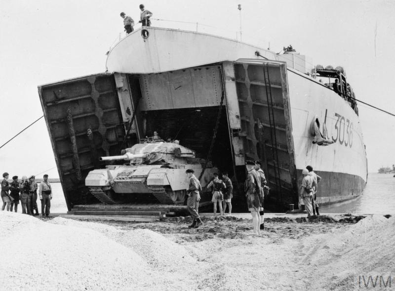 Britain’s 6th Royal Tank Regiment rolling ashore at Port Said, Egypt.