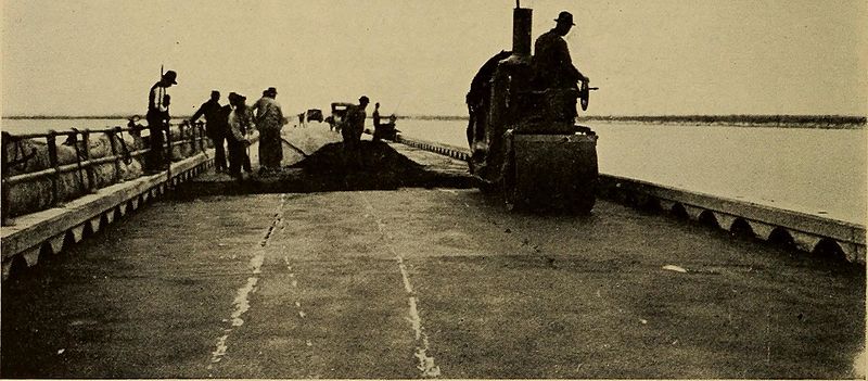 A photograph of a road construction crew in the 1920s building the Yolo Causeway.