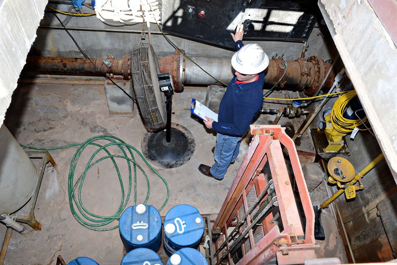 A safety instructor checking fluoridation levels at the Fluoride Feed Station on Tinker Air Force Base in Oklahoma City, OK in 2016