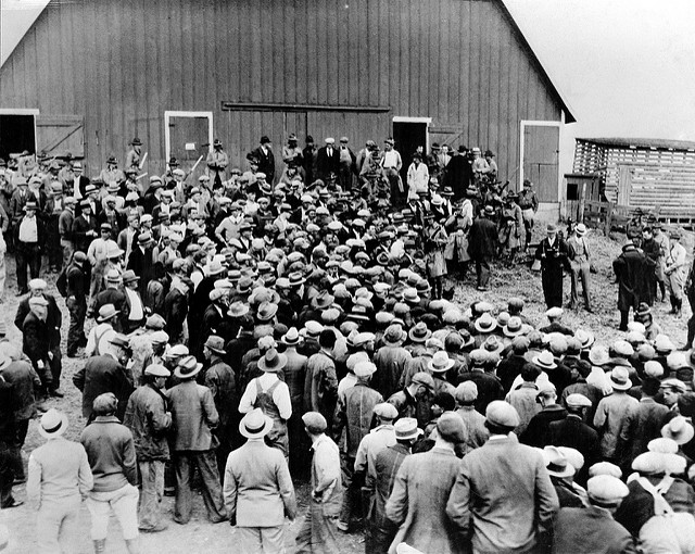 Farmers gathered at a foreclosure auction in Iowa during the 1930s.