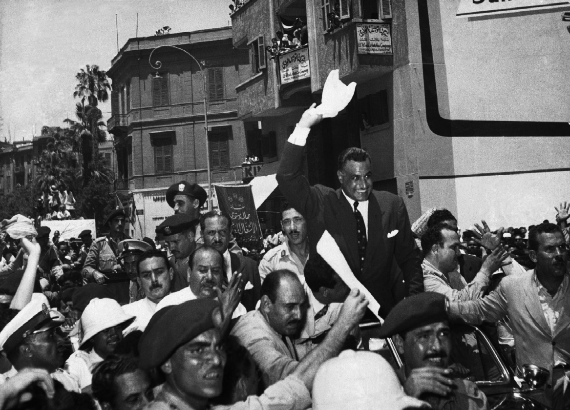 Egyptian supporters cheer President Gamal Abdel Nasser.