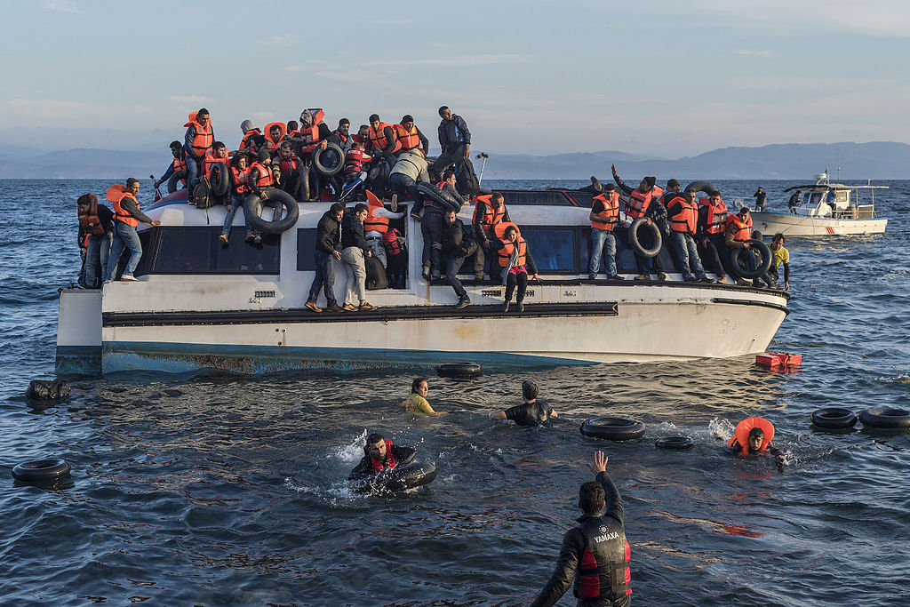 Syrian and Iraqi refugees departed from Turkey and arrive on the Greek island of Lesvos. October, 2015.