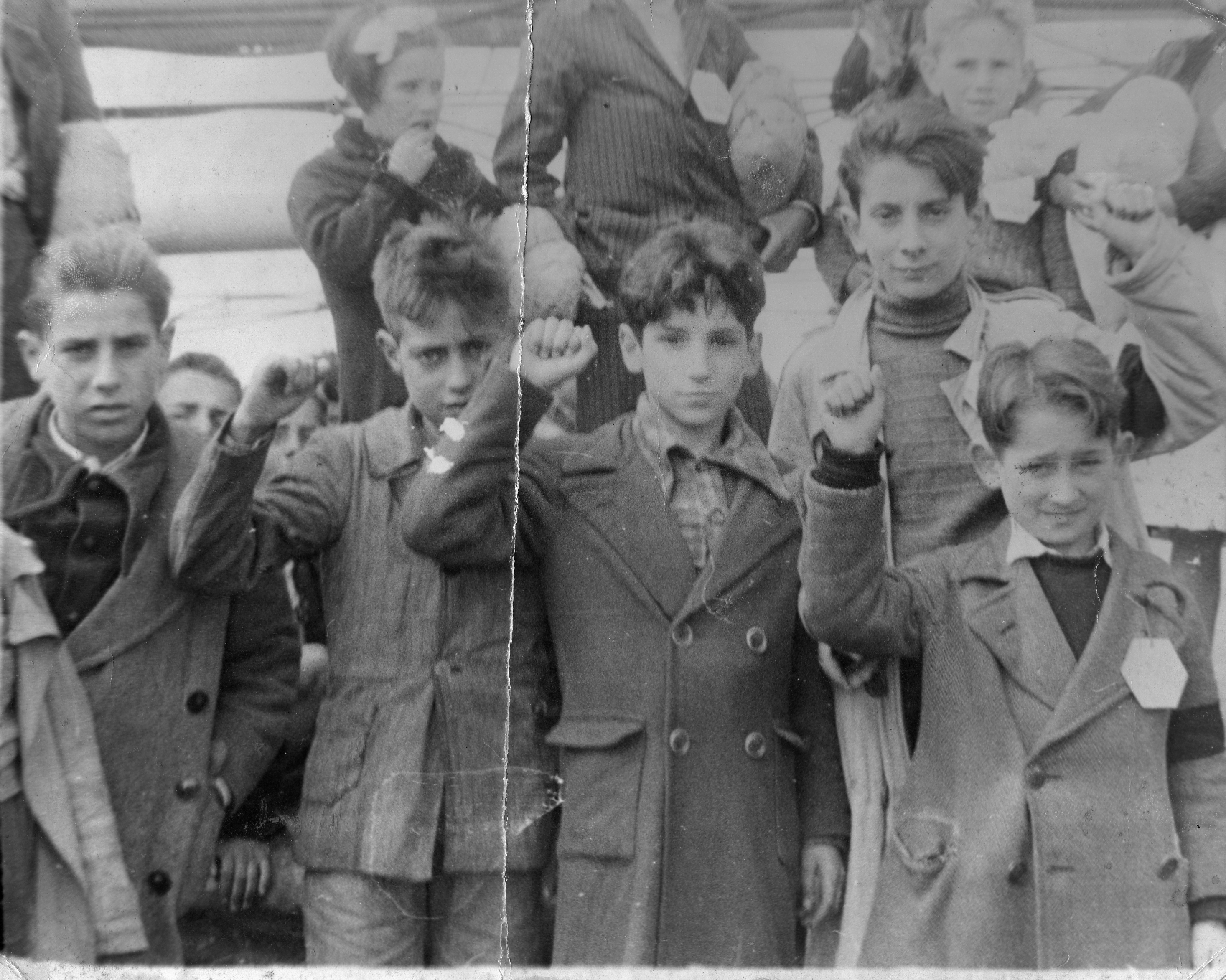 Children evacuated during the Spanish Civil War (1936-1939) giving the Republican salute.