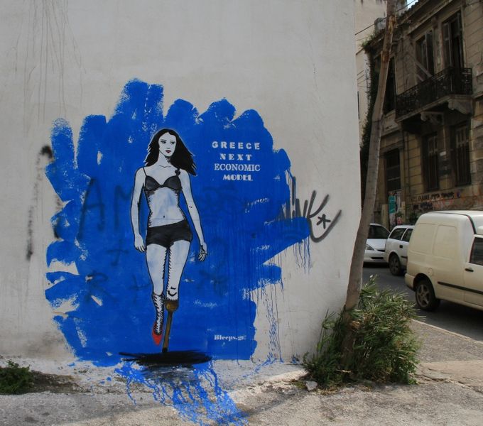 2011 street art in Athens, Greece depicting the country’s financial woes.