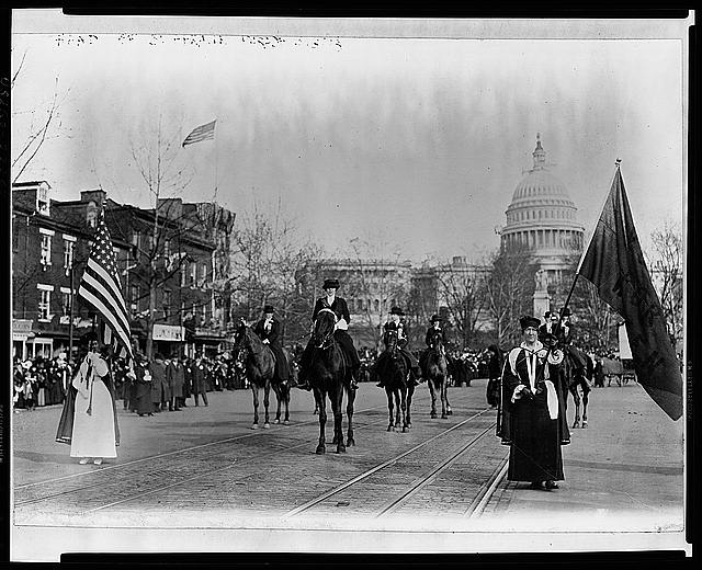 Women suffragists marching on Pennsylvania Avenue in Washington D.C.