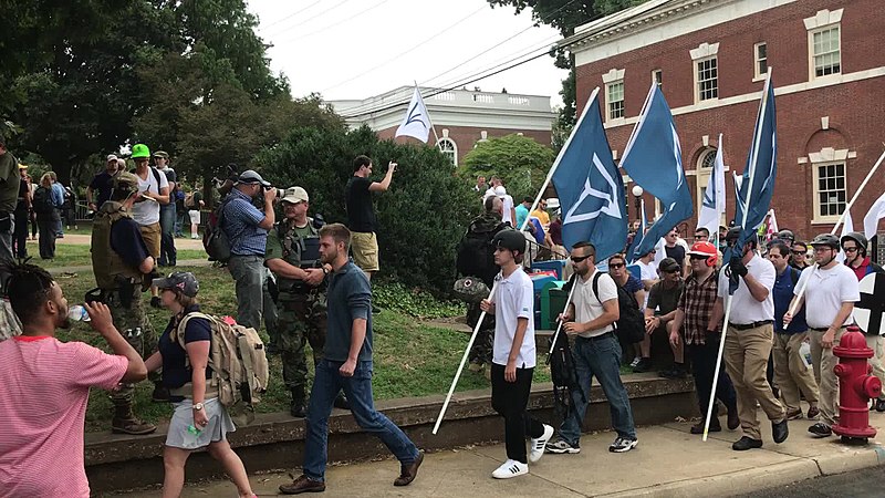 White supremacist protesters in Charlottesville, VA in August 2017 carrying Identity Evropa flags.