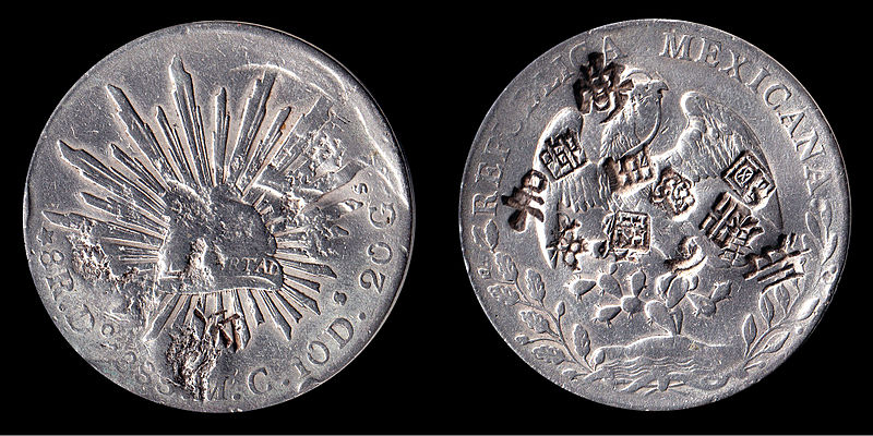 Silver peso of Philip V of Spain minted in Mexico.