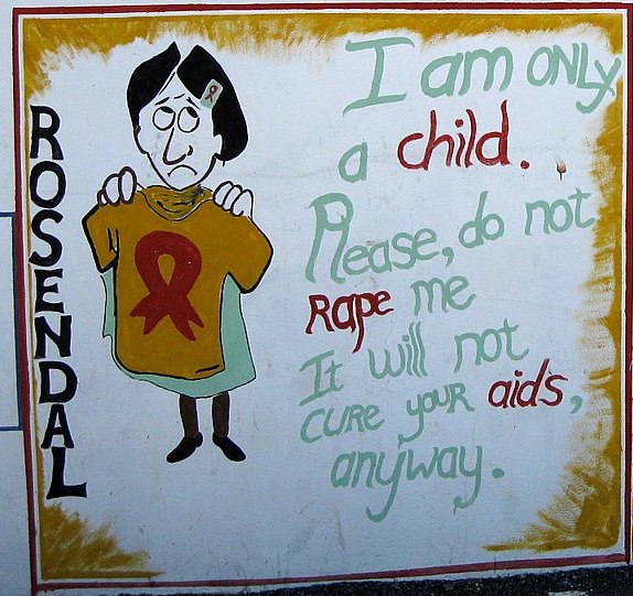 Street art in South Africa from 2008 appealing for men to not rape children.