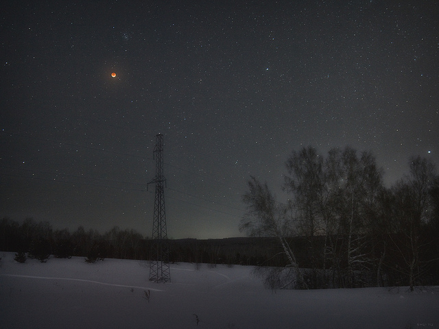 View of a lunar eclipse above Novosibirsk in Siberia, 2018.