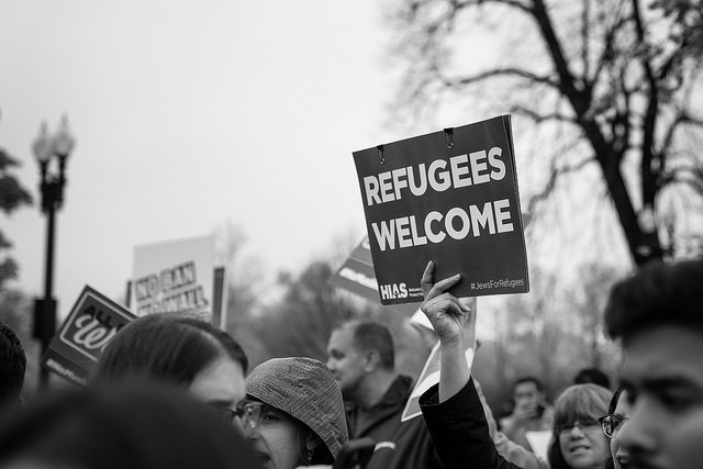 Protesters outside the Supreme Court during oral arguments on Trump’s travel ban.