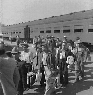 Mexican men arriving in the U.S. through the Bracero Program.