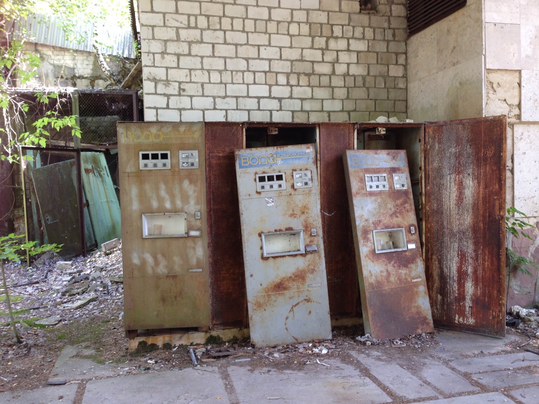 Rusty fizzy water vending machines.