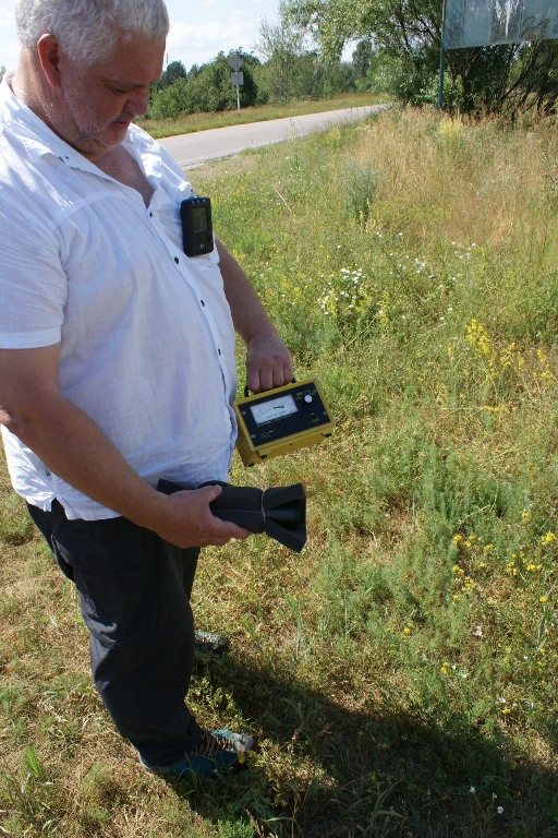 Dr Ian Haslam with Geiger counter and dosimeter.