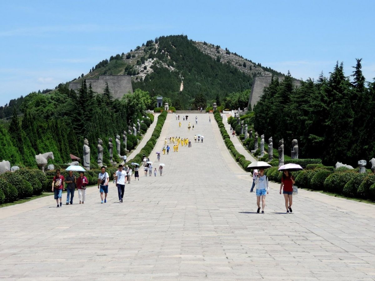Visitors walking the causeway to the Tang Royal Tombs.