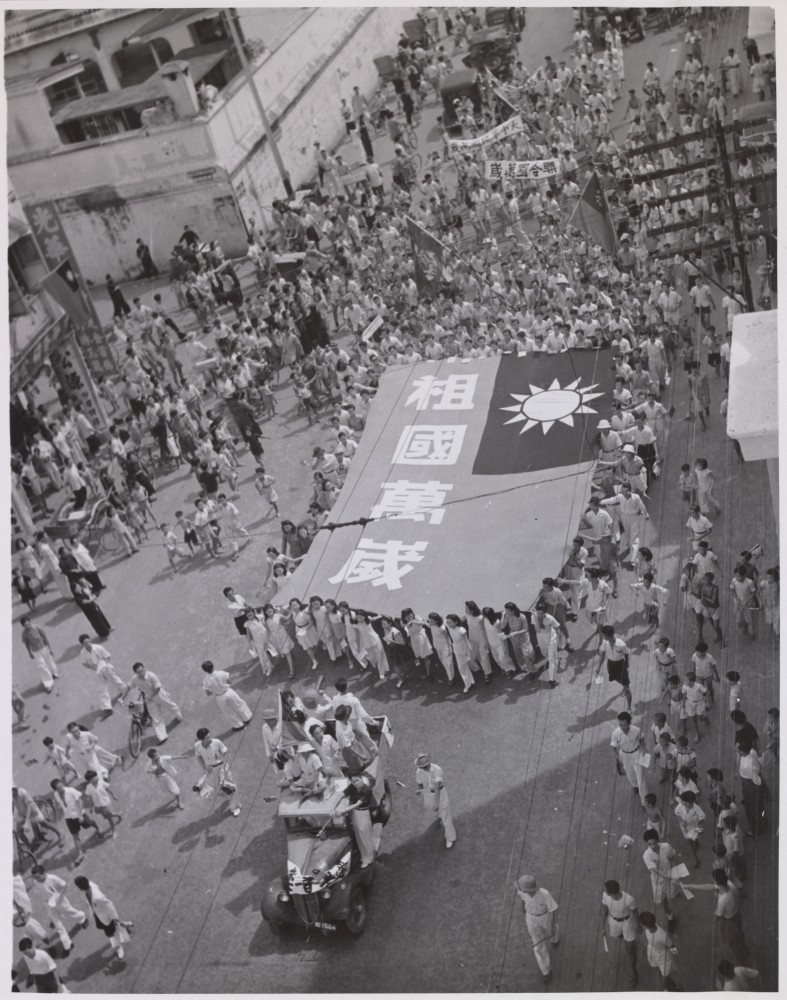 Singapore's Chinese community carries the flag of the Republic of China.