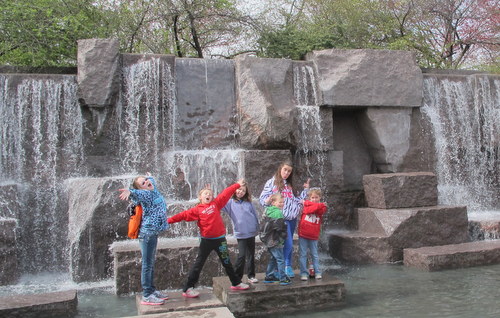 Visitors interact with Halprin's FDR Memorial in Washington, D.C.