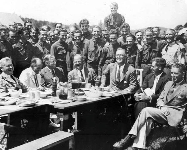 President Franklin Delano Roosevelt enjoys a moment in 1933 with his newly-created Civilian Conservation Corps.