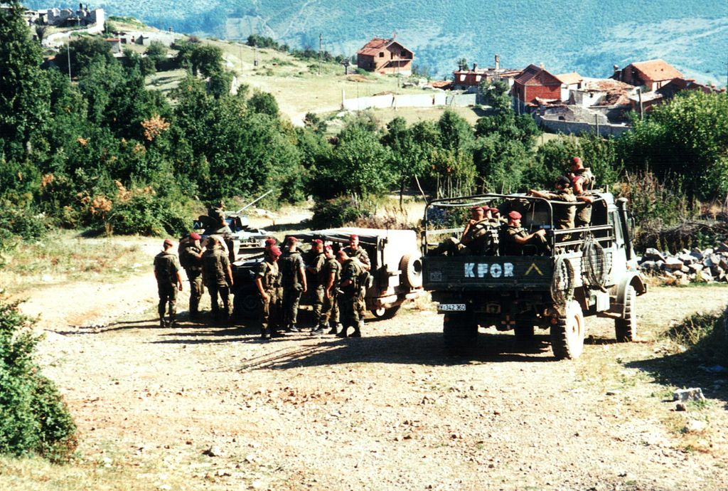 KFOR soldiers patrol Kosovo, 1999.