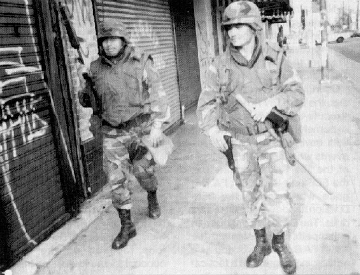 Soldiers from the California Army National Guard patrol the streets of Los Angeles, 1992.