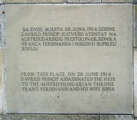 The wall monument at the assassination memorial site was replaced with new, more neutral wording that reflected the evolving interpretation of the events.