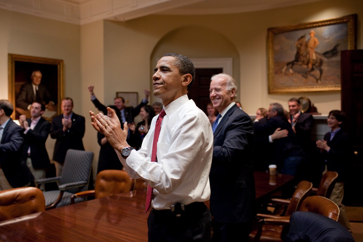 Barack Obama's reaction to the signing of the health care reform bill.