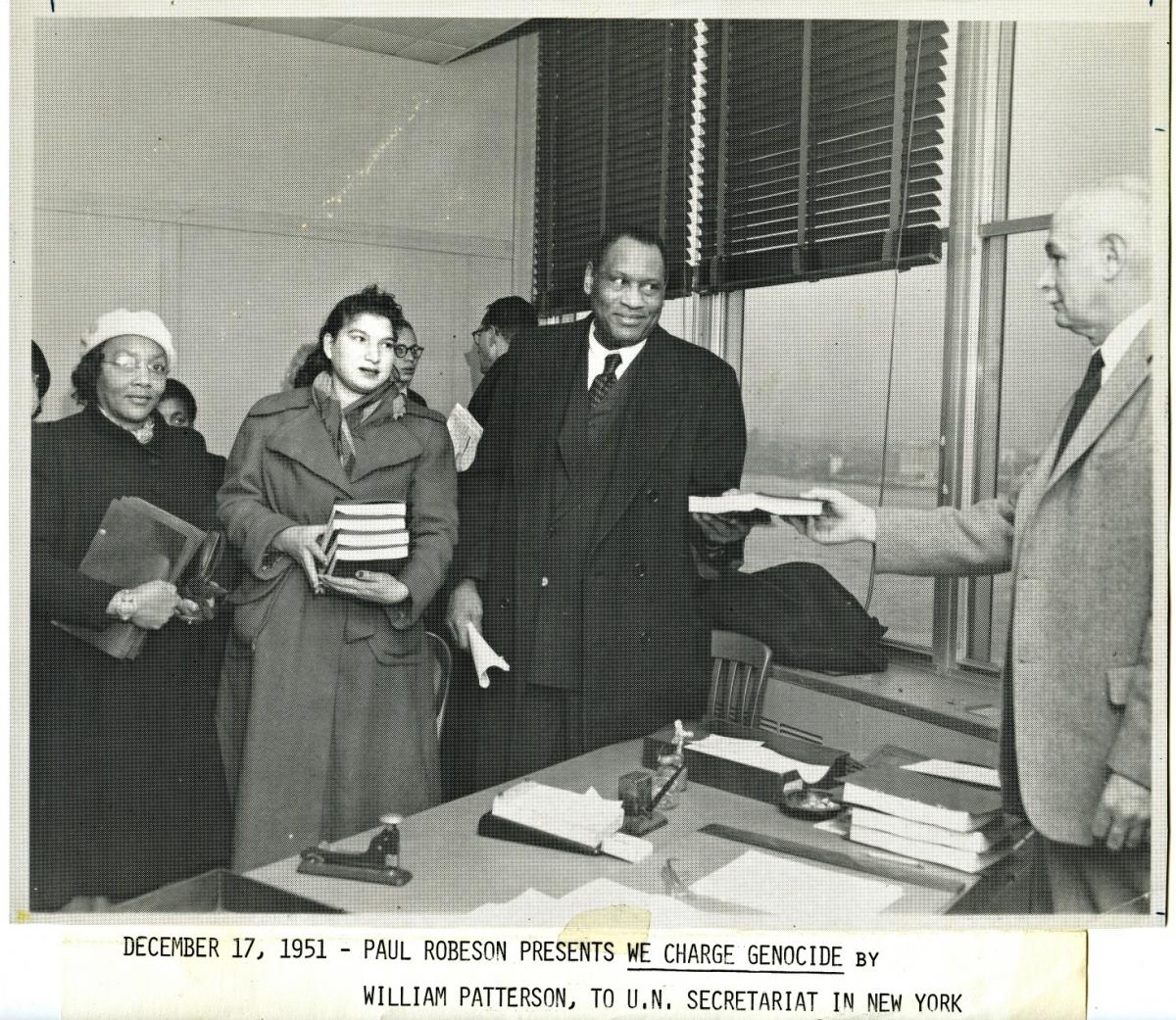 Paul Robeson and other members of the Civil Rights Congress submit 'We Charge Genocide,' a report on police brutality, to the United Nations Secretariat in New York in 1951.