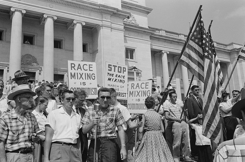 A rally against integrating Central High School in Little Rock, Arkansas in 1959. Protestors connected school desegregation to race mixing and race mixing to both communism and 'the Anti-Christ.'