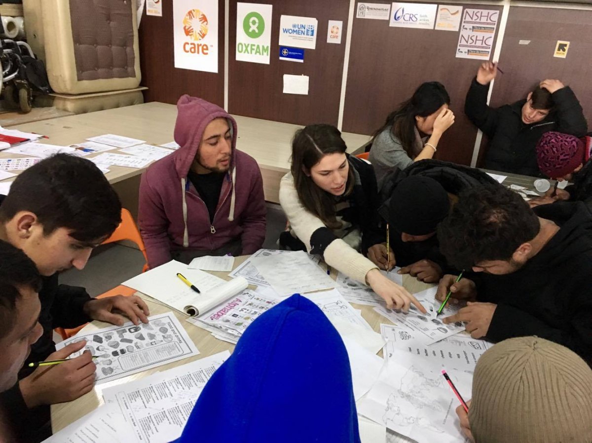 A photo of the author teaching an English lesson in Miksaliste.