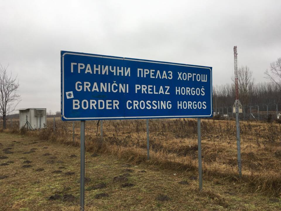 Horgos border crossing with the Hungarian border fence in the distance.