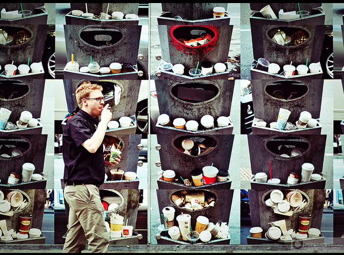 A man walking by photos of overflowing trash.