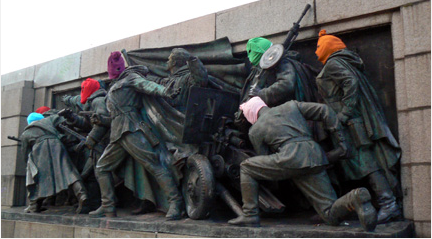 Activists used the monument to protest the arrest of Pussy Riot by placing the distinctive colorful balaclava masks of the Russian punk collective on each of the Soviet army figures.