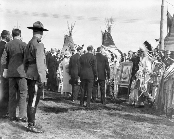 King George VI and Queen Elizabeth meet with Nakoda chieftains.