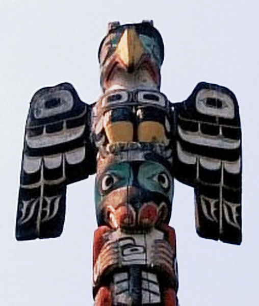 The image of a Thunderbird on top of a totem pole.