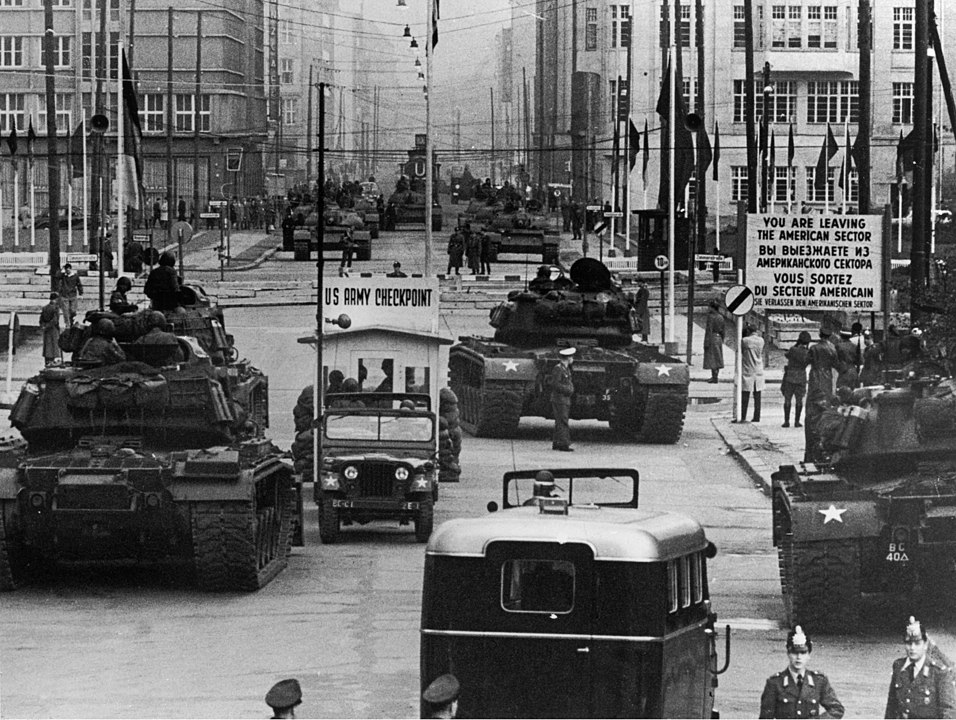 Soviet and American tanks face each other at Checkpoint Charlie.