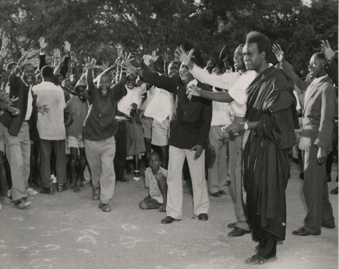 Dr Kenneth Kaunda with United National Independence Party supporters after a meeting with Iain Macleod, Colonial Secretary, Zambia, 1960.