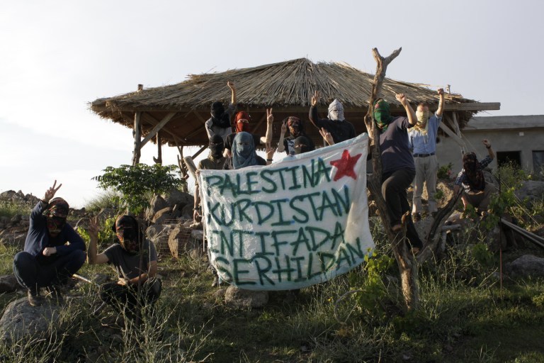 'Palestina, Kurdistan! Intifada, Serhildan!' This slogan represents solidarity between Palestinians and Kurds.