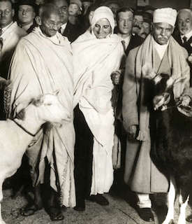 The founder of the Hindu Mahasabha, Madan Mohan Malaviya (right), with Gandhi (left) and Madeleine Slade (center) enroute to England to attend the Round Table Conference in 1931