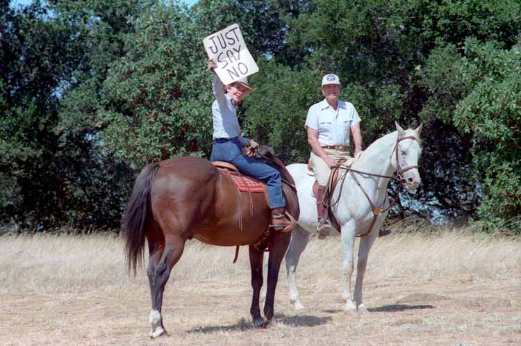 First Lady Nancy Reagan holding a 'Just Say No' sign.