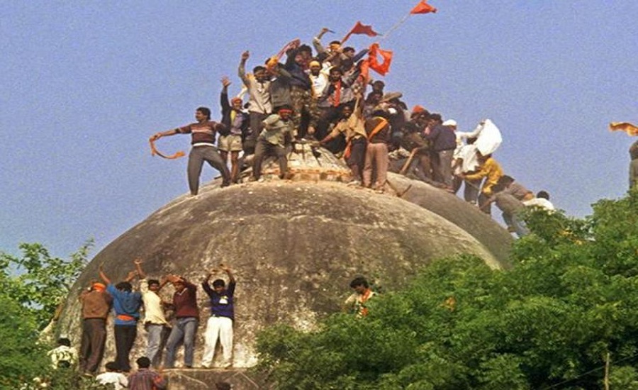 Rioters attack Babri Masjid in 1992