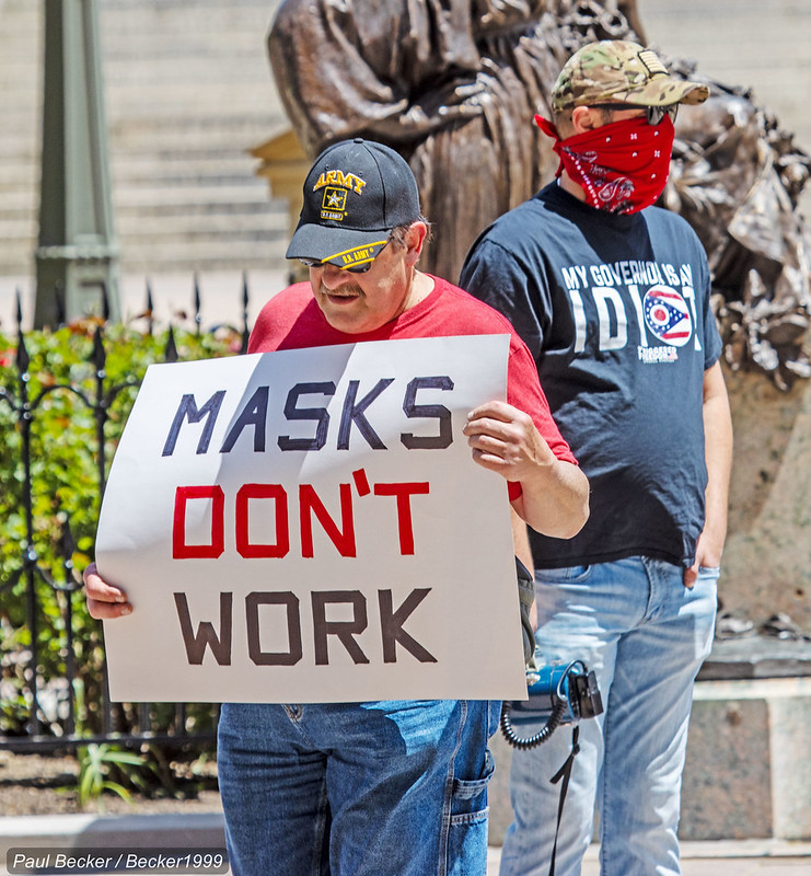 A protestor in Ohio expresses anti-masking sentiments.