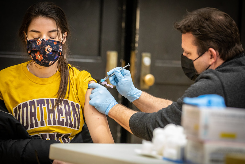 A public school teacher in Des Moines, Iowa receives the COVID-19 vaccine.