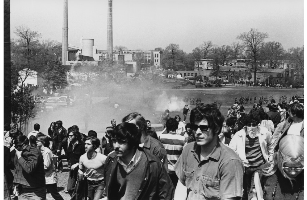 Kent State students moving up Blanket Hill to avoid tear gas.