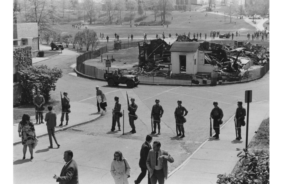Ohio National Guardsmen surround the remains of Kent State's ROTC building.