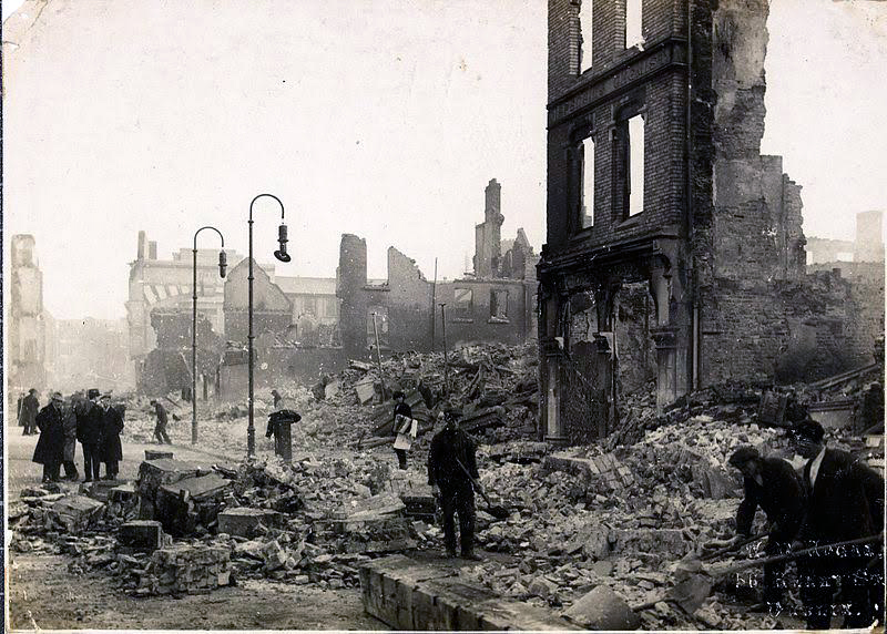 Workers in December 1920 clearing rubble in Cork, Ireland.