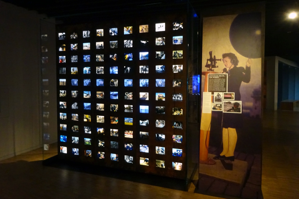 A multimedia display showing the wide variety of professions within the military.