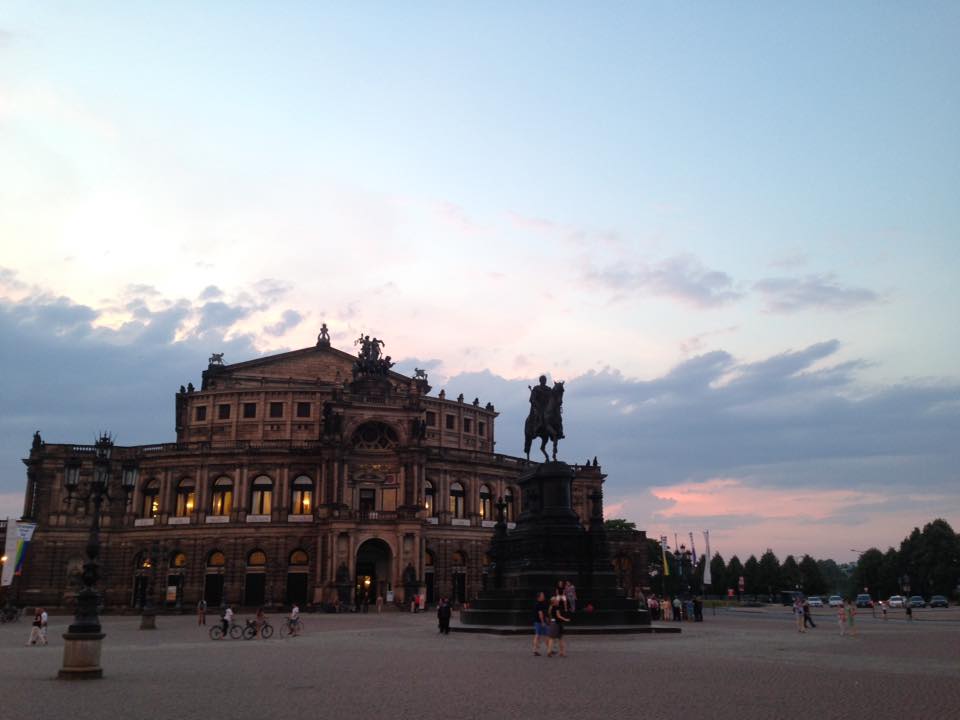 Sunset by the famous opera house, known as the Semperoper.