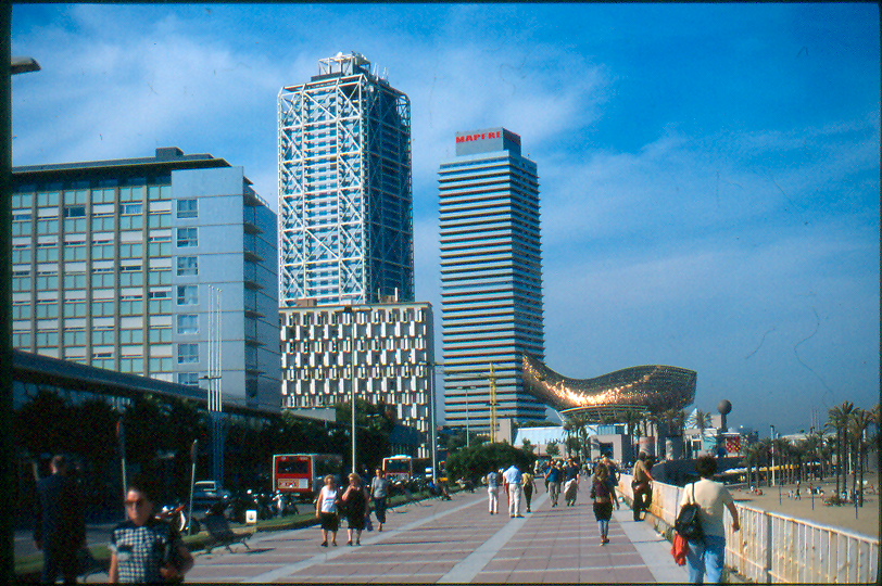 The two tower blocks shown, now converted to hotel, office, and residential space, were once the Olympic Village in Barcelona.