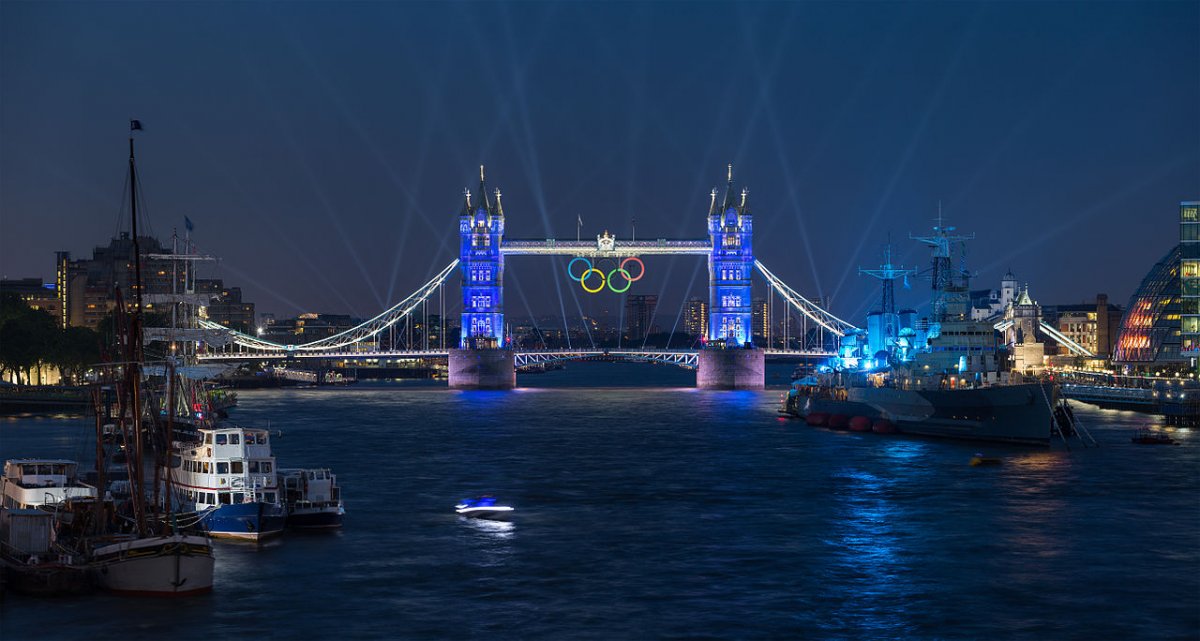 Tower Bridge lit up with the Olympic Rings.