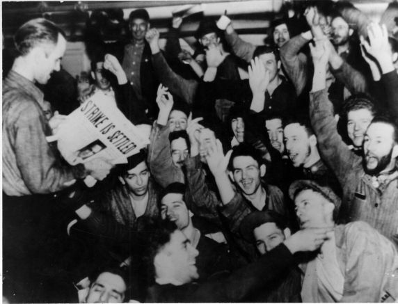 Workers celebrating the end of the strike after 44 days.